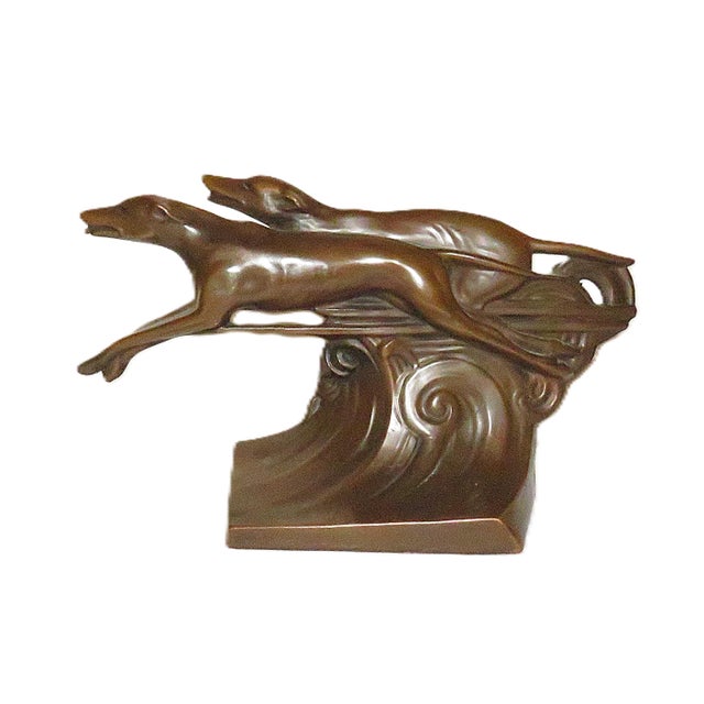 FREE SHIPPING ANYWHERE IN THE CONTINENTAL US! This is a set of unique bookends featuring greyhound dogs. Highly stylized...