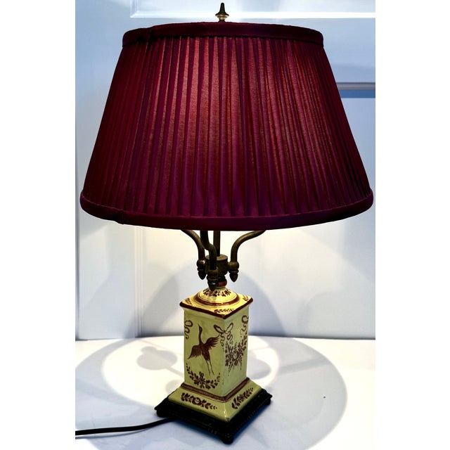 A distinguished decorative piece with antique charm, perfect for curated interiors or collections. A ceramic variation of...