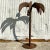 A fantastic vintage patinated metal palm tree. A chic torch cut design in a gnarly metal finish. A real boho tropical...