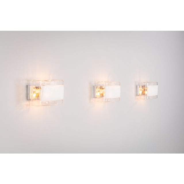 A refined set of three vintage wall lamps produced by the renowned Italian glassmaker La Murrina, celebrated for its...
