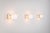 A refined set of three vintage wall lamps produced by the renowned Italian glassmaker La Murrina, celebrated for its...