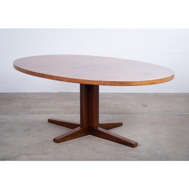 Elegant oval dining table designed by John Mortensen and produced by Heltborg Møbelfabrik in Denmark during the 1960s....