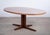 Elegant oval dining table designed by John Mortensen and produced by Heltborg Møbelfabrik in Denmark during the 1960s....