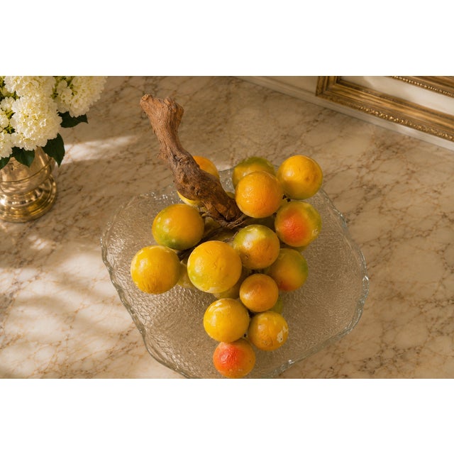 Description: Bring timeless European elegance to your home with this beautiful vintage hand-carved alabaster fruit...
