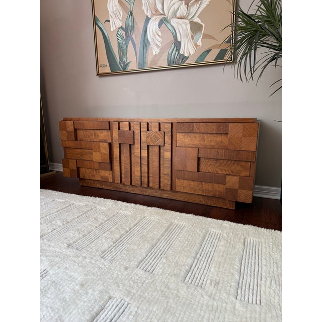 Fully refinished and beautiful dresser made by Lane Furniture Co. in the 1970s. Features a three-dimensional wood block...