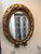 Vintage Style Antique Gold Oval Wall Mirror With Bow For Sale - Image 4 of 4