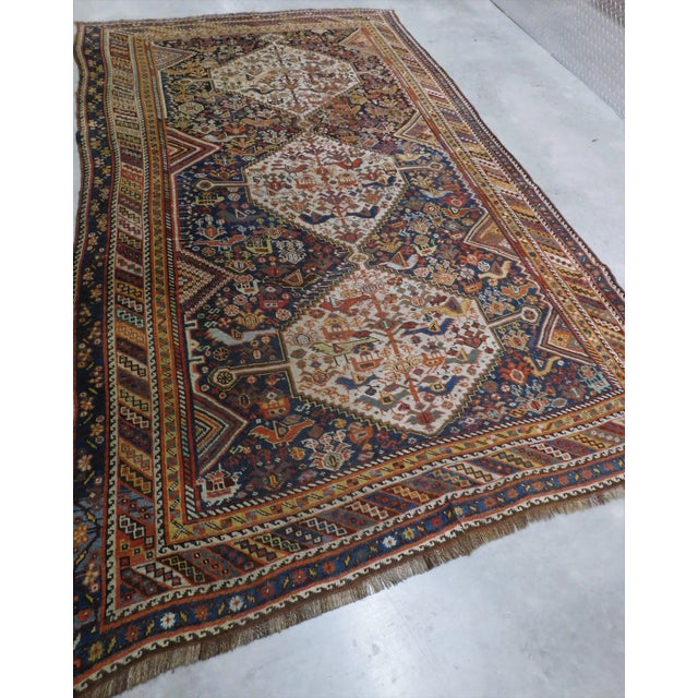 Circa: 1900 Origin: Persian Material: wool pile Weaving technique: Hand-knotted Description: Triple ivory medallion on...