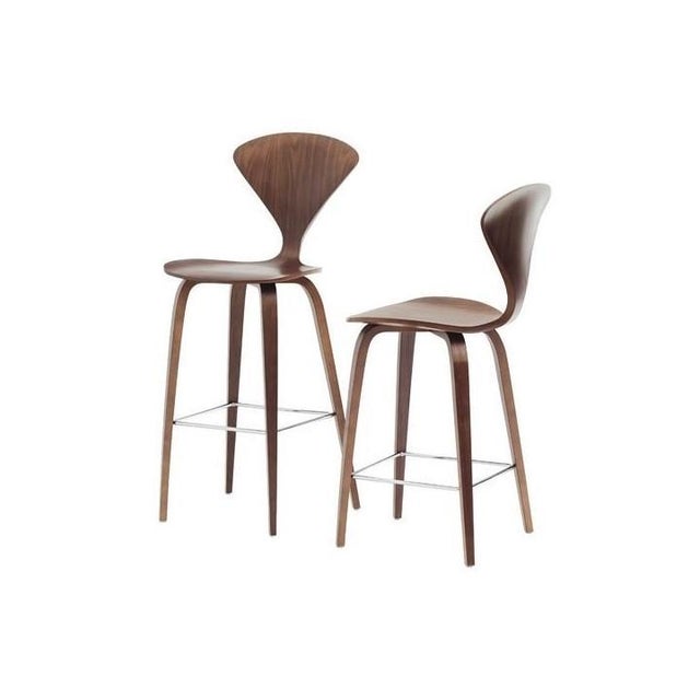 The molded plywood side chair by norman cherner, dating back to 1958, is the perfect companion to the classic cherner...