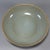Classic Chinese official‑style celadon porcelain washer with low‑profile rounded body and raised foot base. The entire...