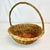 We have here a traditional wicker gathering basket in a Boho Chic speckled wicker. This basket in round in shape with a...