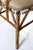 Antique asymmetrical Aesthetic Movement chair. Faux tortoise bamboo with upholstered seat, back and arms Tassels on the...