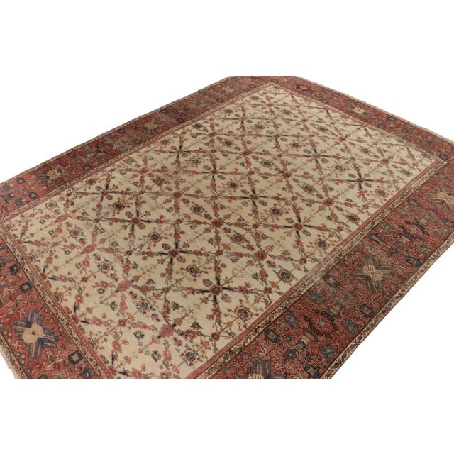 Hand-knotted in wool circa 1880-1900, this 13x17 antique Persian Sultanabad rug is a rare curation from Rug & Kilim. On...