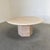 Remarks: Vintage coffee from the 1970s. Round travertine table top and hexagon base. Table is in excellent condition....