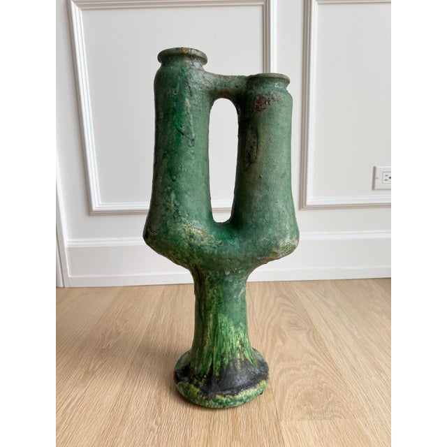A monumental 21-inch tall Brutalist studio pottery vessel. This hand-built sculptural vase features a striking "U-form" or...