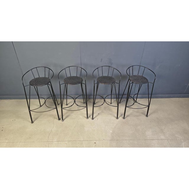 Elegant french bar stools with black painted wicker seats and a wrought iron frame. Beautiful design, timeless and rustic....