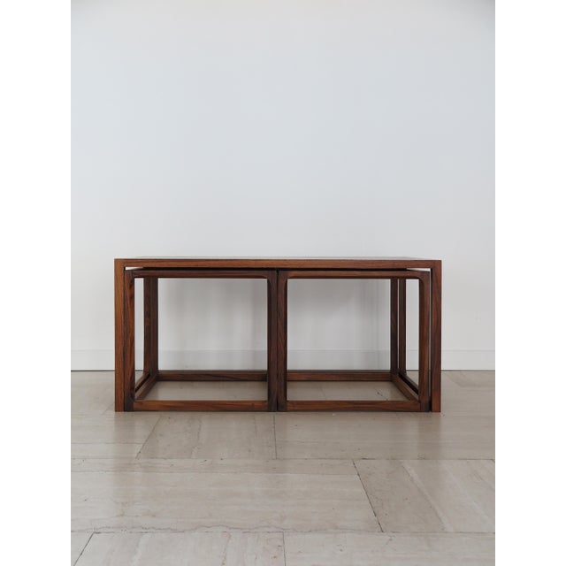 Scandinavian dark wood interlocking coffee table set produced by Aksel Kjersgaard with solid wood frame, Denmark 1960s...