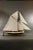 Six foot model of the Boston built America's Cup yacht Puritan. Fine model with planked deck, skylights with brass bars,...
