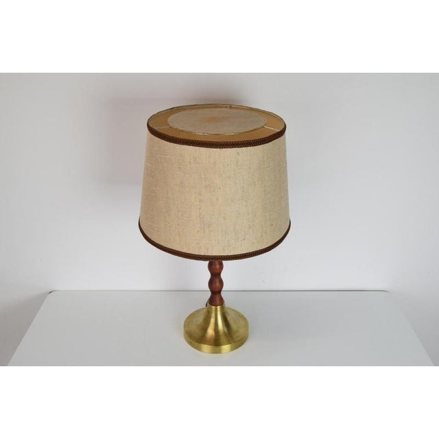 Made in Czechoslovakia Made of fabric, wood, brass New cabling with aged patina 1xE27 or E26 bulb US adapter included Good...