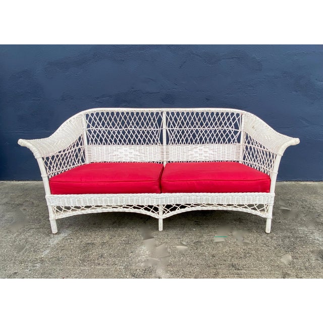 This is an iconic Cottage Core Bar Harbor Wicker sofa that dates to the first half of the 20th century. The sofa is a...