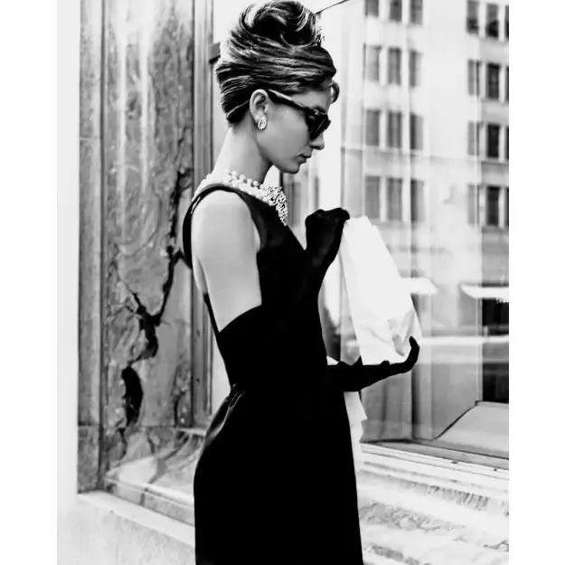 Audrey Hepburn Breakfast at Tiffany's Iconic Shot Iconic capture of Audrey Hepburn in her role for "Breakfast at...
