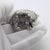 A charming and solidly crafted piece, this vintage Italian large miniature depicts a brown bear cub with a warm and...