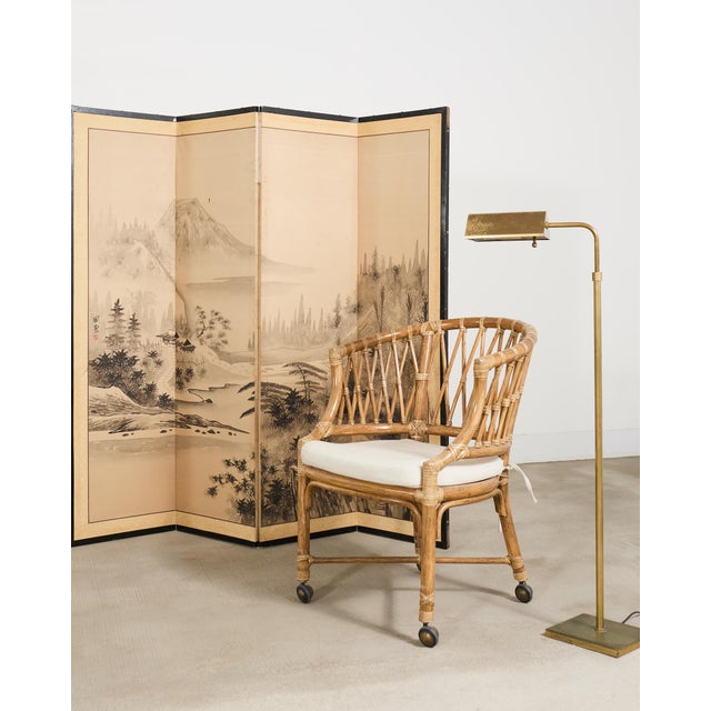 A refined mid-century modern patinated brass pharmacy floor lamp made in the style and manner of similar lamps by Koch and...