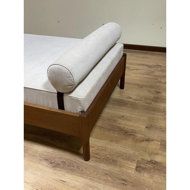 1960s daybed made of teak wood and of Italian manufacture. The daybed has been completely restored recently. It is...