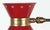 Articulated sconce in the style of Stilnovo. Red enamel shade has star cut-out detail on either side.