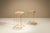 A light architectural frame and warm upholstery give this pair of Italian bar stools an understated presence. Attributed...