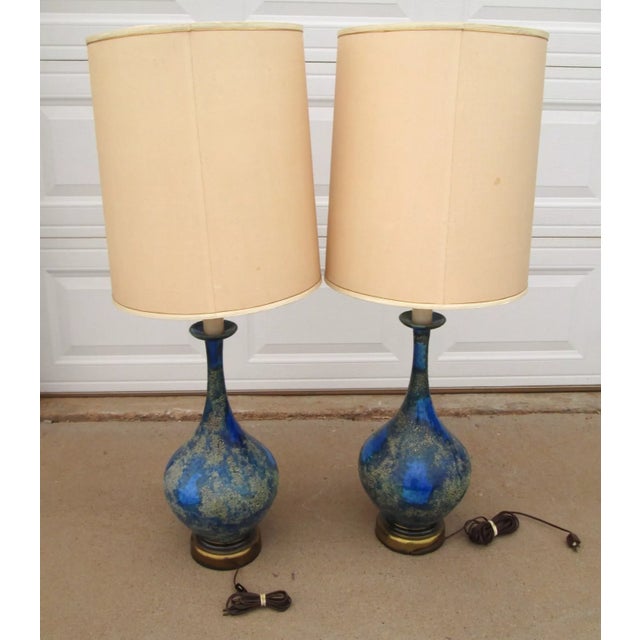 Vintage Helmut Bruchman Style Mid Century Modern Blue Glaze Ceramic Lamps. The lamps are a "genie bottle" shape and have a...