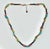 This is such a lovely little Beaded Necklace. It has a colorful mix of beads and five petite Turquoise rocks. They are...
