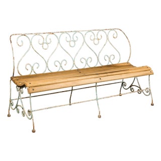 1920s French Rustic Iron Garden Bench with Scrolling Motifs and Slatted Seat For Sale