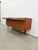 Authentic vintage mid century modern teak credenza / sideboard / console. By Greaves and Thomas. Maker's label on back....