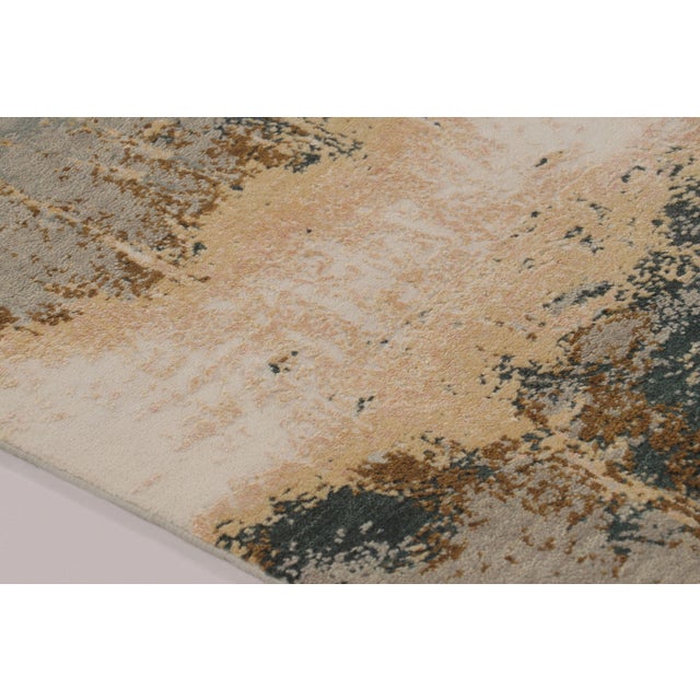 Hand-knotted in a luxurious blend of wool and silk, this 8x10 rug from Rug & Kilim’s Modern collection represents a...