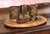 Decorate a desk or study with this charming antique desk accessory set crafted in France, circa 1920. Mounted on a rich...