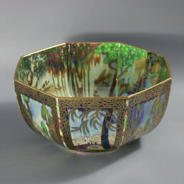 Wedgwood Fairyland lustre octagonal bowl decorated in Dana, 'castle on a road' design, on a mother of pearl ground to the...