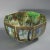 Wedgwood Fairyland lustre octagonal bowl decorated in Dana, 'castle on a road' design, on a mother of pearl ground to the...
