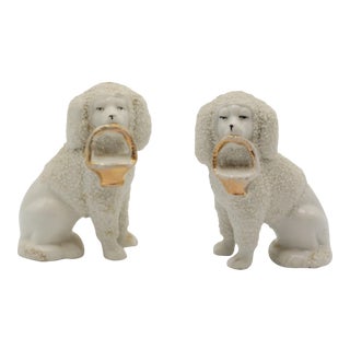 Antique Staffordshire Style Poodle Dogs With Baskets - a Pair For Sale