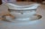 Attached Gravy boat and plate from Paul Muller Selb, Bavarian china. The hand painted piece is trimmed in black and gold...