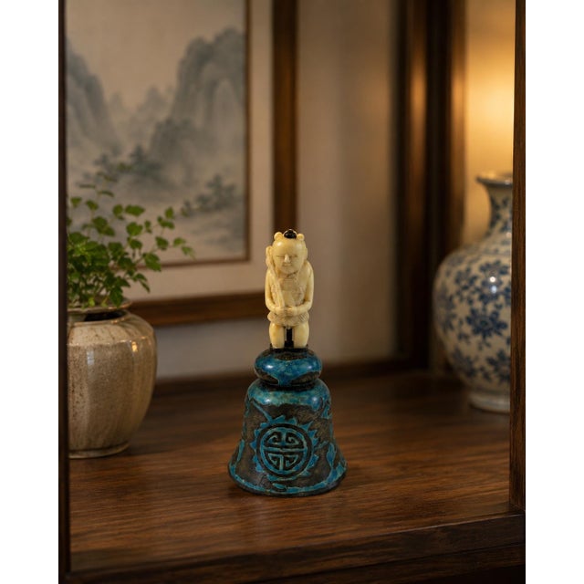This unique vintage Chinese bell features a beautifully enameled bronze body in vibrant turquoise and black, adorned with...