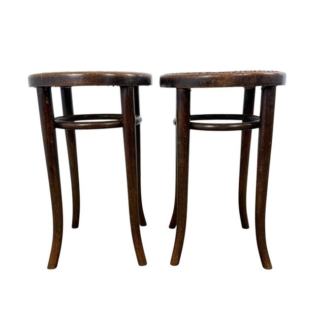 Add timeless elegance to your interior with this charming set of two Thonet bentwood stools. Known for their refined...