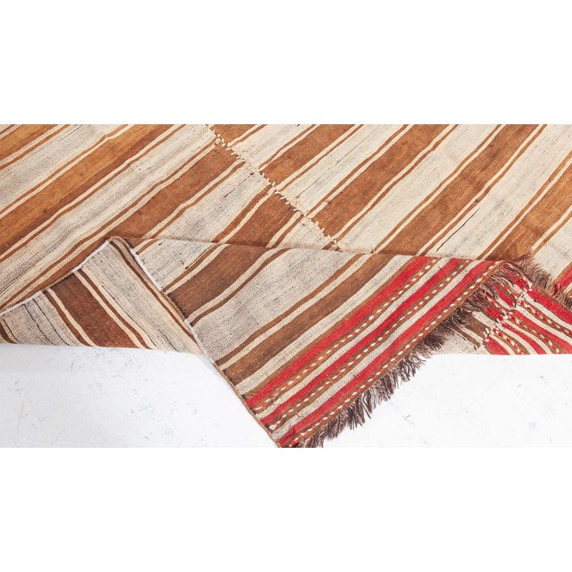 Vintage Turkish Kilim Rug Size: 7'2" × 12'2" (218 × 370 cm) A striking example of traditional Anatolian craftsmanship,...