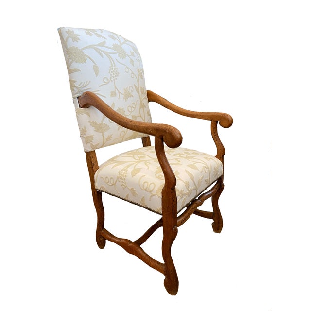 Late 19th century French Mutton Bone arm chair with sturdy hand carved oak frame. The new upholstery of crewel embroidery...