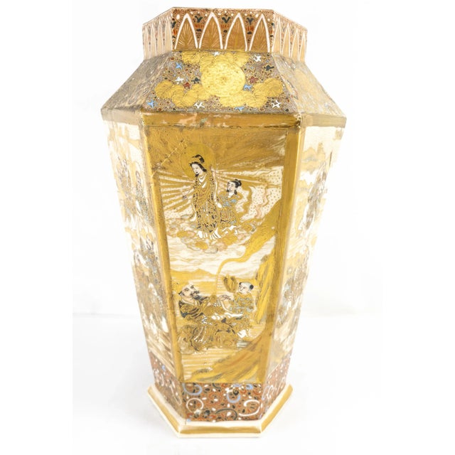 We are selling this vibrant gilt decorated Japanese Satsuma vase with faceted sides with figures in landscapes. Condition:...
