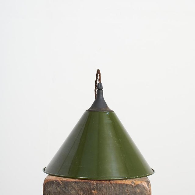 A mod issue field light. The light is made spun aluminium finished in the original british army green paint, part of the...
