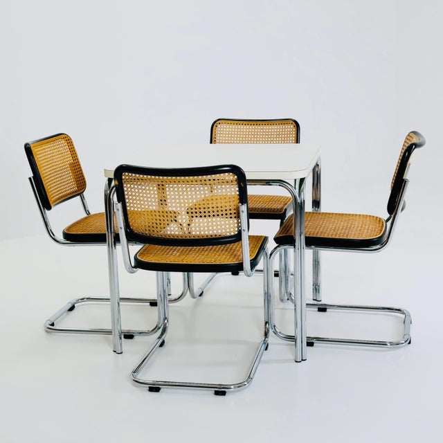 Elegant mid century square dining table designed and produced by Thonet Germany in the 1980s, reflecting the timeless...