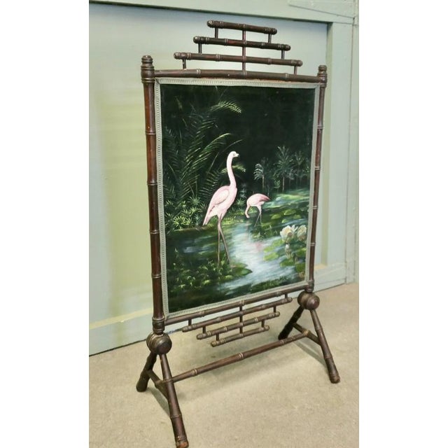 Black Lacquer Oriental Fire Screen, Painted with Flamingos A superb black Lacquer Chinoiserie Fire Screen, with a velvet...