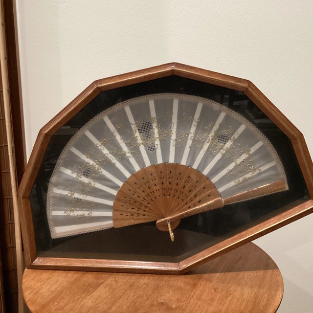 An antique oversized Victorian French sheer silk and overlay lace folding hand fan in wood frame. Very nicely done. 19th...