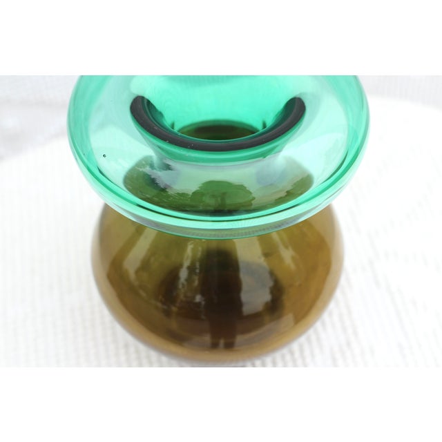 Unique design for Kosta Boda by Vicke Lindstrand. Amber green and bottle green ombre vase with weighted crystal base. Acid...