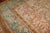 An early 20th century oversize square Turkish Oushak rug with an all-over design on a pink ground Measures: 16'10'' x 17'